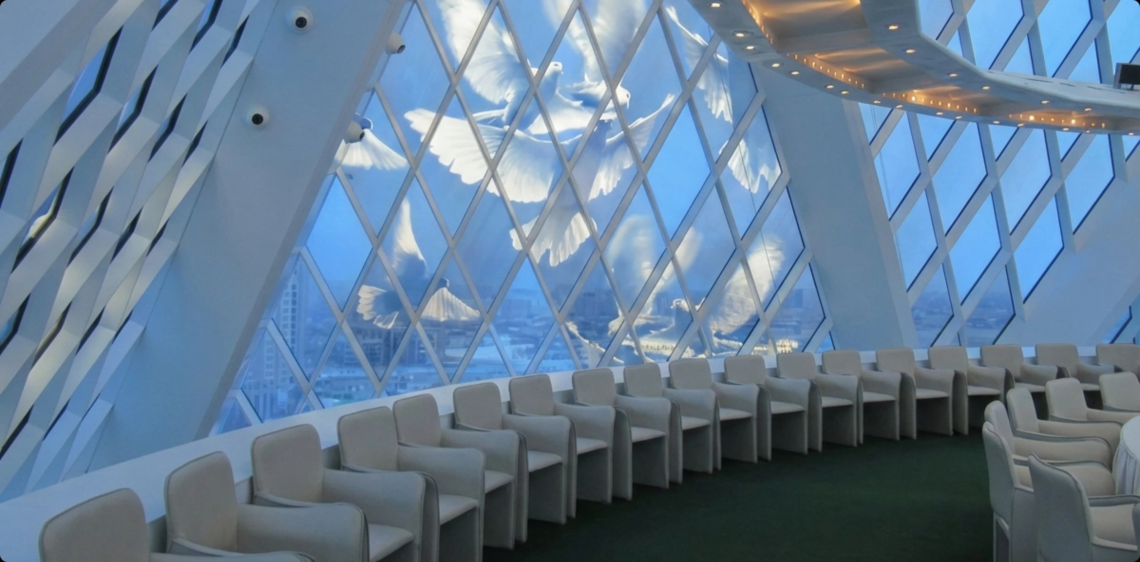 Stained-glass dome with 130 white doves